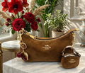 Coach suede leather bag (mini purse and charm included)