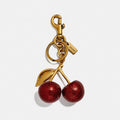 Coach cherry charm